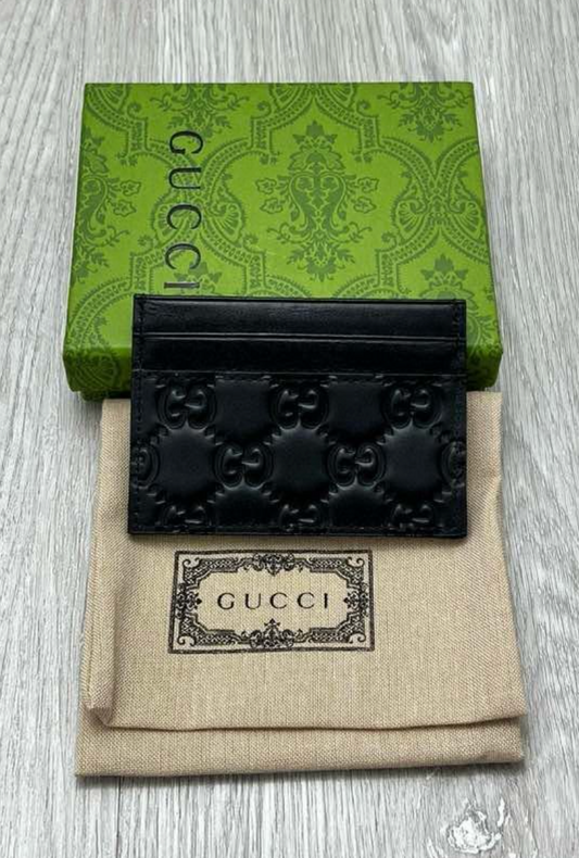 Tarjetero Gucci Signature