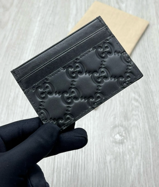 Tarjetero Gucci Signature