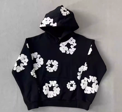 Sudadera Denim Tears Negra con Flores Blancas