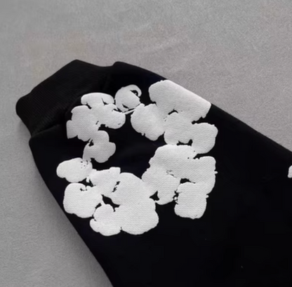 Sudadera Denim Tears Negra con Flores Blancas