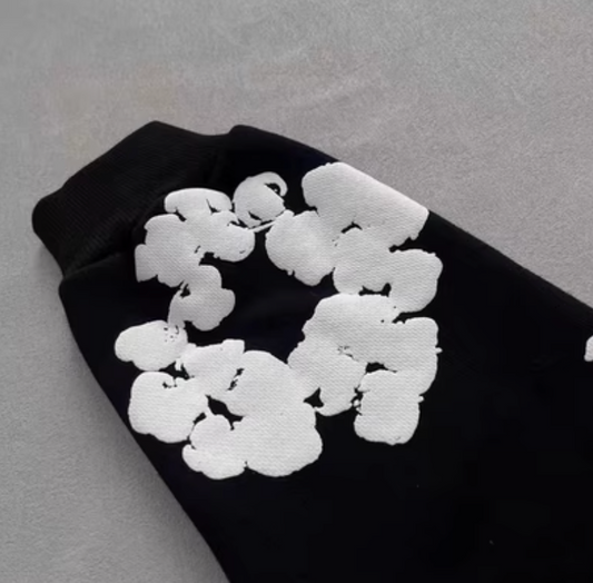 Sudadera Denim Tears Negra con Flores Blancas